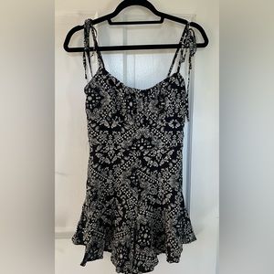Black adjustable strap romper